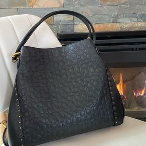 Signature Embossed Edie Shoulder bag 31